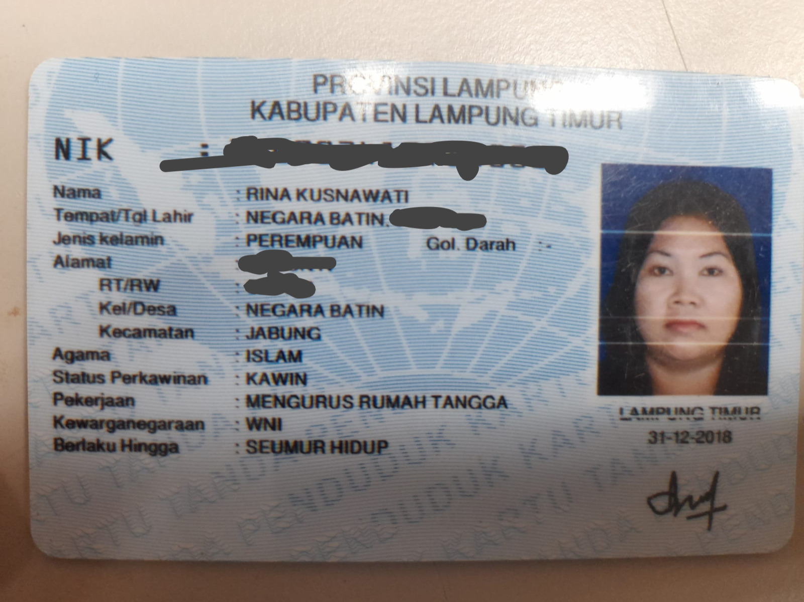 Telah ditemukan kartu identitas atas nama Rina Kusnawati